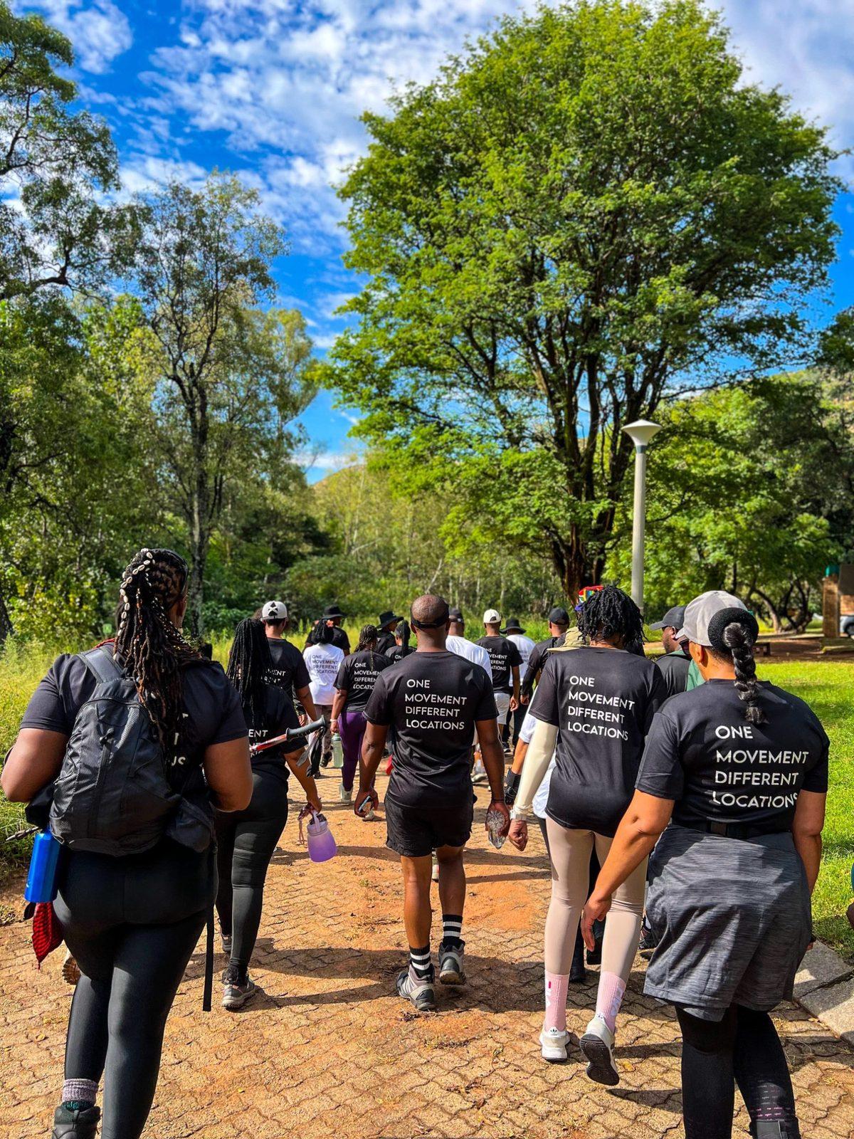 The crew in One Movement Different Locations shirts